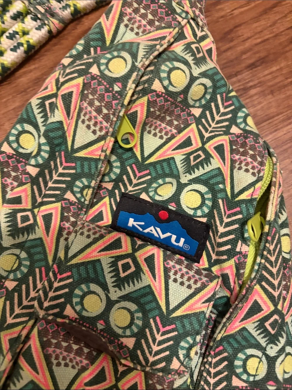Kavu Green Geometric Pattern Rope Sling Bag with Yellow Accents